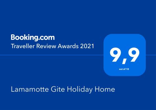 Pinel-HauteriveLamamotte Gite Holiday Home的带有文本旅行拖车审查奖的蓝色盒子