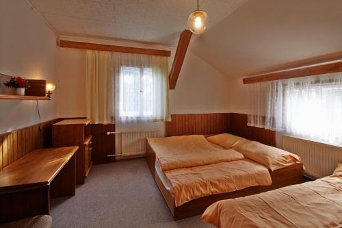 卡博托瓦布达山林小屋客房内的一张或多张床位