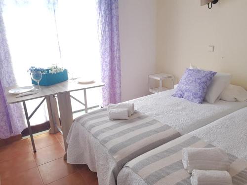 Quartos Abelha客房内的一张或多张床位