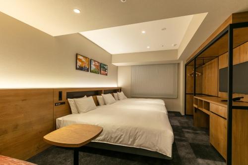 Hotel Forza Osaka Namba客房内的一张或多张床位