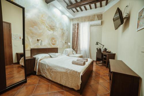 隆达圣安吉洛套房旅馆客房内的一张或多张床位