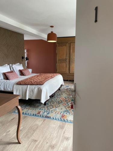 La Maison Gervaiserie & Spa客房内的一张或多张床位