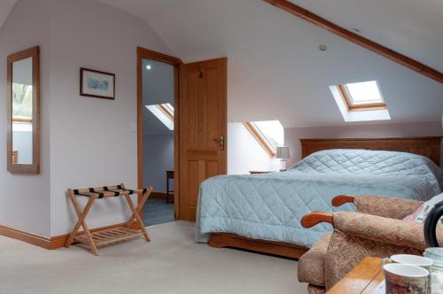 Creeghduff Lodge客房内的一张或多张床位