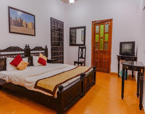 Hotel Lal Garh Fort And Palace客房内的一张或多张床位