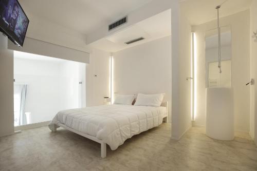 Luxury House Lecce -Le mie 3 Suites-客房内的一张或多张床位