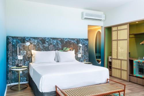 Mercure Rio Boutique Hotel Copacabana客房内的一张或多张床位