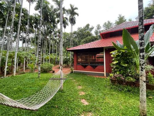 NIDHIVANA FARMS & RESORT, bakrebail-salethoor rd, Mangalore外面的花园