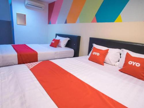 OYO 90281 Hotel Taj seksyen 13客房内的一张或多张床位