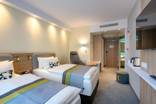 Holiday Inn Express - Fulda, an IHG Hotel客房内的一张或多张床位