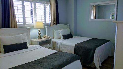 贝壳岛度假酒店​​ - 所有皆为海滨套房客房内的一张或多张床位