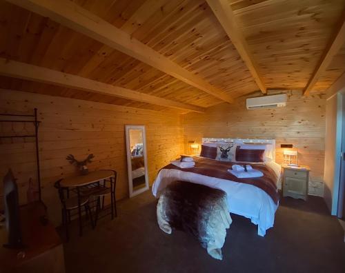 Foxhill Lodges客房内的一张或多张床位