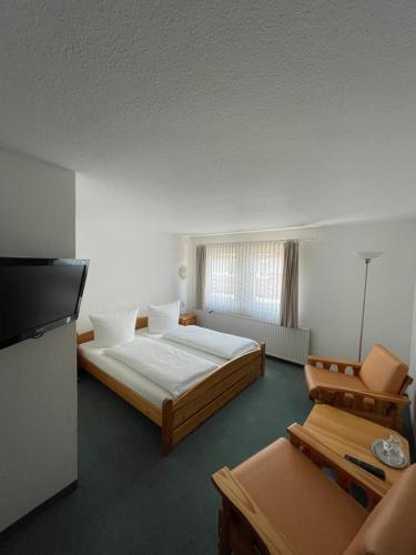 Hotel Garni „zum Bären“客房内的一张或多张床位