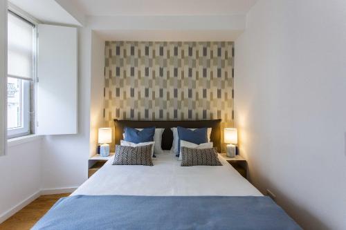 Prestige Ajuda Apartment客房内的一张或多张床位