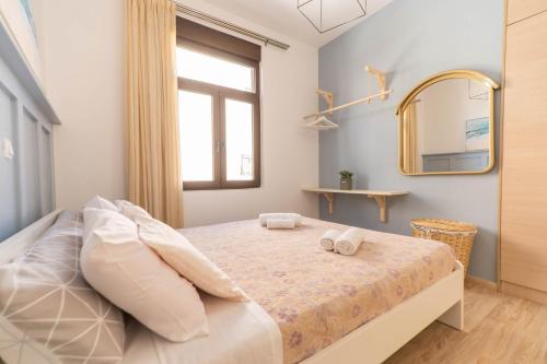 Blue Sea Relax Apartment客房内的一张或多张床位