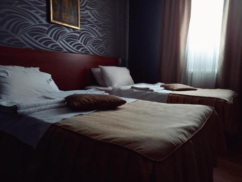 Hotel IL Sole客房内的一张或多张床位