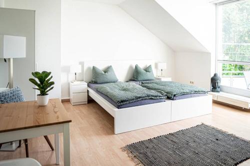 Gemütliche Ferienwohnung im Zentrum von Plauen客房内的一张或多张床位