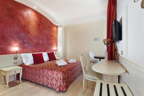 Hotel Spiaggia客房内的一张或多张床位