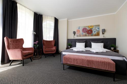 艾则瑞温泉酒店客房内的一张或多张床位