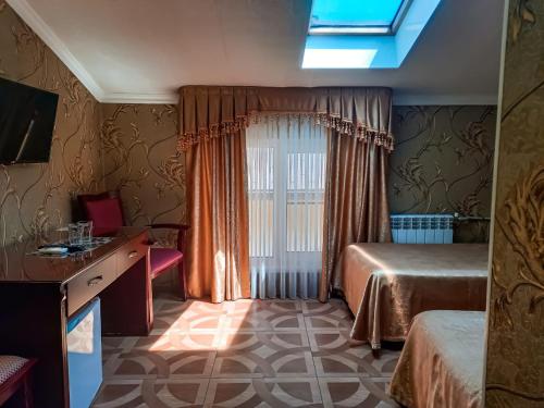 Hotel Olymp Pervaya Liniya客房内的一张或多张床位