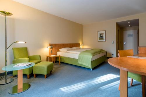施罗斯公园酒店客房内的一张或多张床位