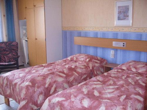 塔卡瓦尔卡酒店客房内的一张或多张床位