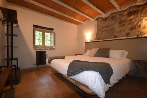 Casa Rural Masia Can50客房内的一张或多张床位