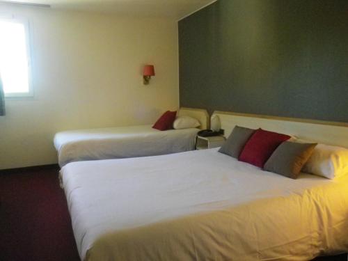 沃雷普艾米斯酒店客房内的一张或多张床位