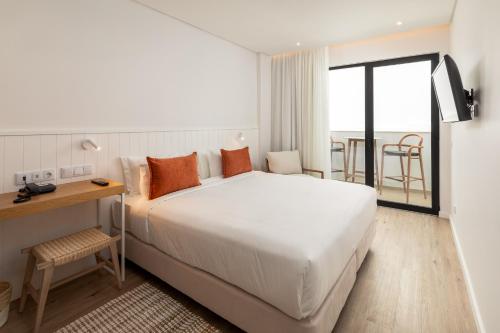 Pure Formosa Concept Hotel客房内的一张或多张床位