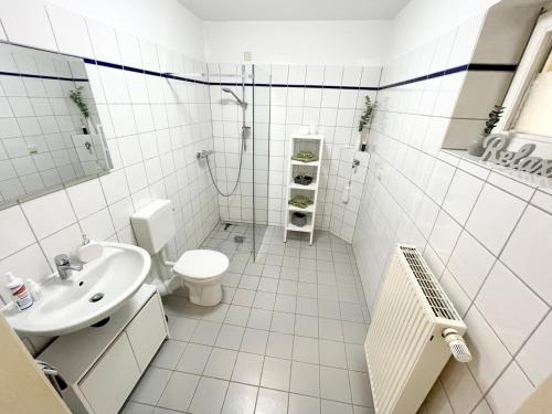 Ferienwohnung Blickfang - Modernes Apartment direkt in der Altstadt von Erfurt mit Balkon - beste Lage und Aussicht的一间浴室