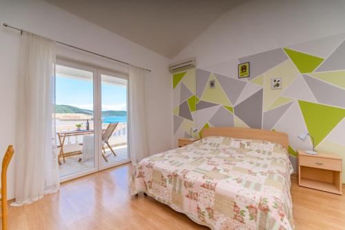 Apartmani Noris (app2)客房内的一张或多张床位