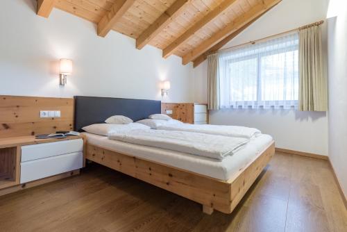 Strasserhof tenuta-Weingut客房内的一张或多张床位