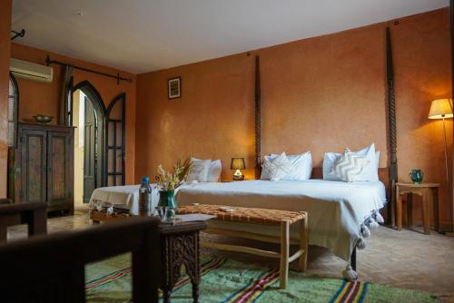Riad Dama & Spa客房内的一张或多张床位