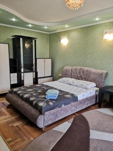 Уютная квартира возле CITY Mall客房内的一张或多张床位