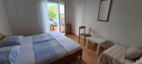 Adria Arba Apartments客房内的一张或多张床位