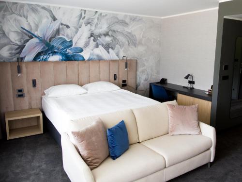Elegans Hotel Brdo客房内的一张或多张床位