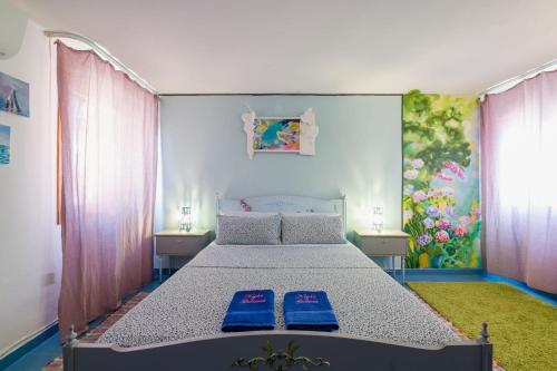 布拉诺岛Night Galleria holiday home - bed & art in Burano - the pink house的相册照片