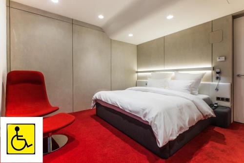 格罗夫设计酒店客房内的一张或多张床位