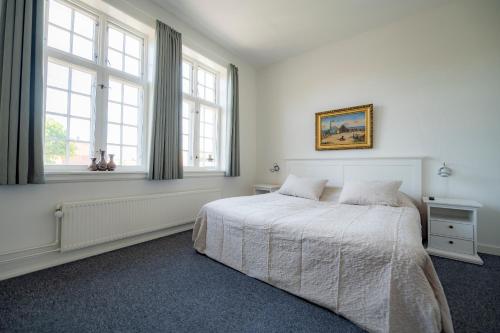 Det Gamle Posthus客房内的一张或多张床位