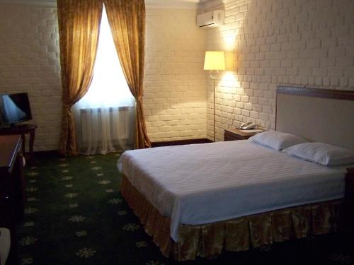 阿里恩广场酒店客房内的一张或多张床位