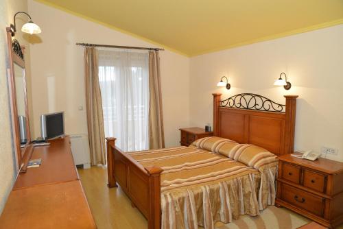 Hotel Venezia Imotski客房内的一张或多张床位