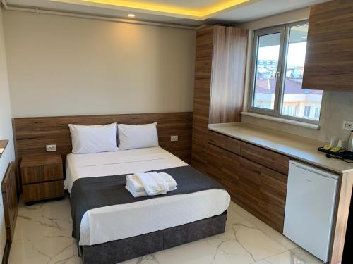 Royal Residence Bursa客房内的一张或多张床位