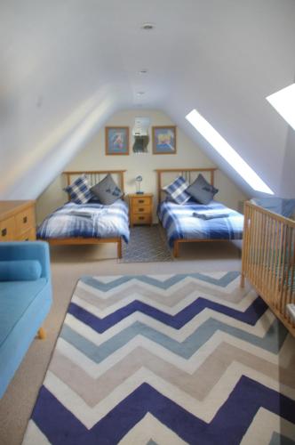 Ty Nant Cottages and Suites客房内的一张或多张床位