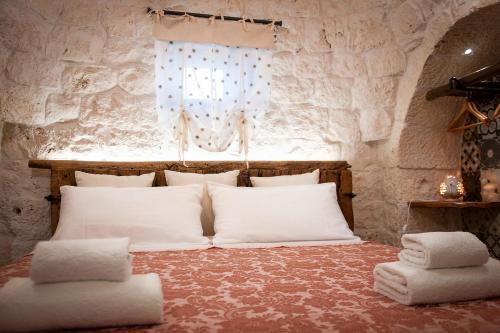 LiberaMente - Trulli & Quiete客房内的一张或多张床位