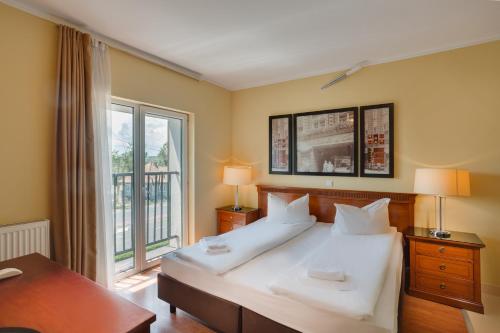 图尔内辣椒汽车旅馆客房内的一张或多张床位