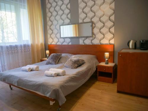 Radość Natura Tour客房内的一张或多张床位