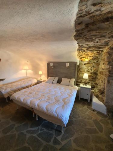 Ranch du Haut-Languedoc客房内的一张或多张床位