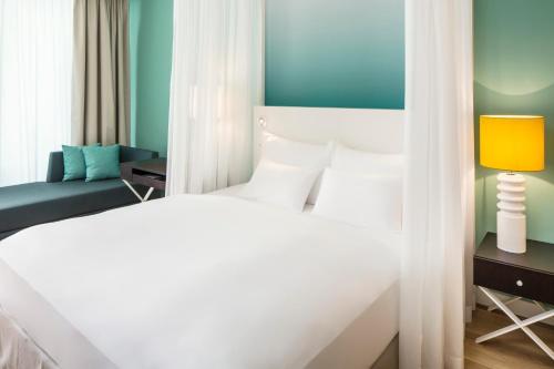 福克斯坦恩耶索洛酒店&Spa客房内的一张或多张床位