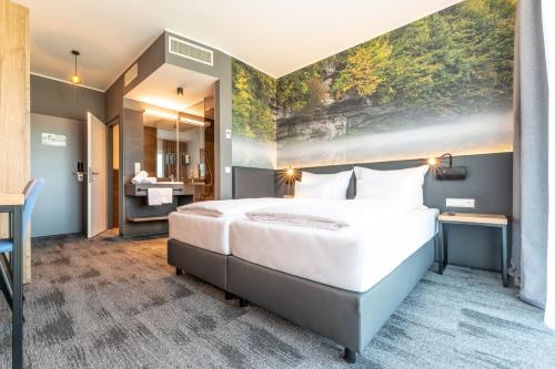 Aiden by Best Western Stadtgut Hotel Steyr - FREE PARKING客房内的一张或多张床位