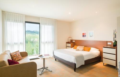 里昂大都会酒店客房内的一张或多张床位