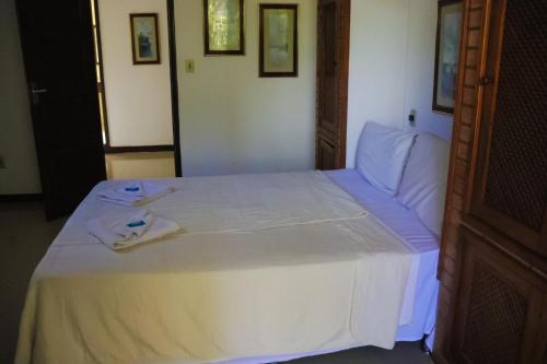 Hotel Itamaracá客房内的一张或多张床位